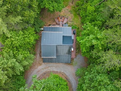 A peaceful lakeside escape awaits in this charming mountain - photo 48