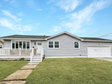 Welcome home on Hamilton. This fully remodeled and somewhat - photo 2