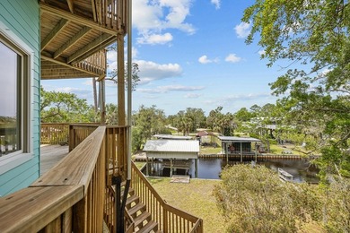 WATERFRONT HOUSE FOR SALE IN Suwannee!! This charming 3-bedroom - photo 34