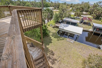 WATERFRONT HOUSE FOR SALE IN Suwannee!! This charming 3-bedroom - photo 38
