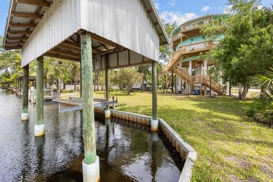 WATERFRONT HOUSE FOR SALE IN Suwannee!! This charming 3-bedroom - photo 48