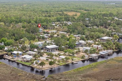 WATERFRONT HOUSE FOR SALE IN Suwannee!! This charming 3-bedroom - photo 59
