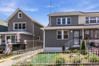 Welcome to 171-38 105 Avenue, a beautifully renovated two-family - photo 1