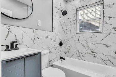 Welcome to 171-38 105 Avenue, a beautifully renovated two-family - photo 7