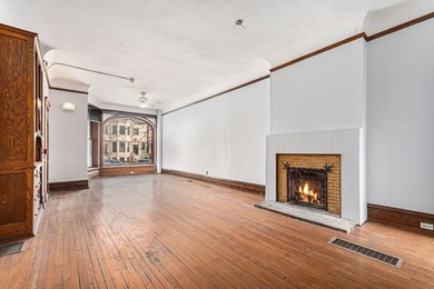Welcome to this stately Greystone row house in Chicago's - photo 3
