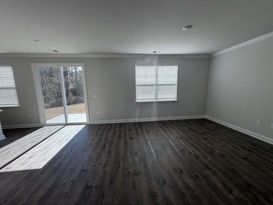 This home in the gated neighborhood of Waterbridge is brand new - photo 5