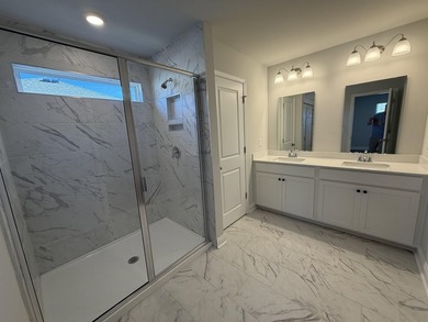 This home in the gated neighborhood of Waterbridge is brand new - photo 7