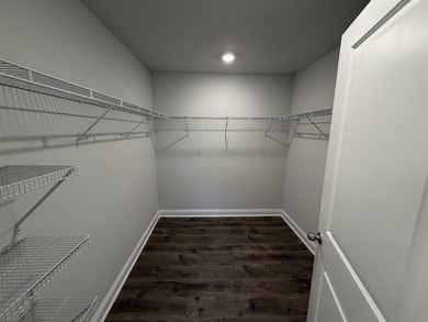 This home in the gated neighborhood of Waterbridge is brand new - photo 8