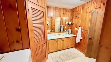Some lake homes are built to impress. Others are built to be - photo 14