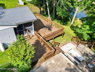 Updated waterfront home, dock & boat ramp in subdivision! - photo 1