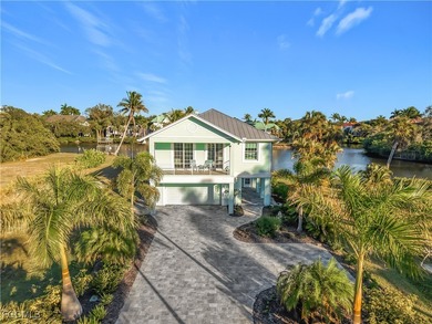 REFINED IMPERIAL RIVER LIVING WITH GULF ACCESS! Waterfront