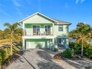 REFINED IMPERIAL RIVER LIVING WITH GULF ACCESS! Waterfront