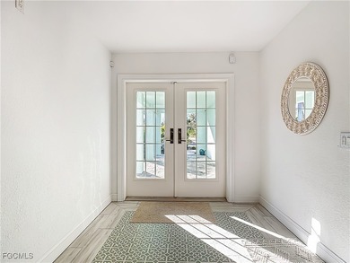 REFINED IMPERIAL RIVER LIVING WITH GULF ACCESS! Waterfront