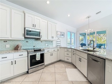 REFINED IMPERIAL RIVER LIVING WITH GULF ACCESS! Waterfront