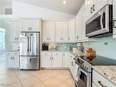 REFINED IMPERIAL RIVER LIVING WITH GULF ACCESS! Waterfront