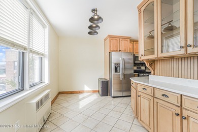 Spacious 3 bedroom, 2 bath, sun filled gorgeous, updated condo - photo 12