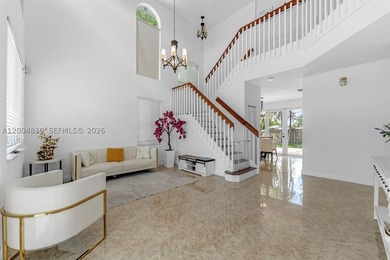This 4-bedroom, 3-bath two-story home at 13891 SW 39th Ter - photo 5