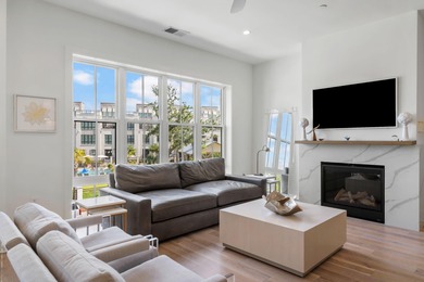 This stunning, corner unit, 3 bedroom, 3.5 bath townhome is