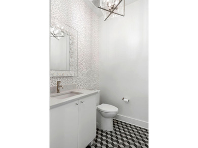 This stunning, corner unit, 3 bedroom, 3.5 bath townhome is