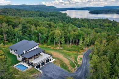 Lake Home For Sale in Sainte-Catherine-de-Hatley, 