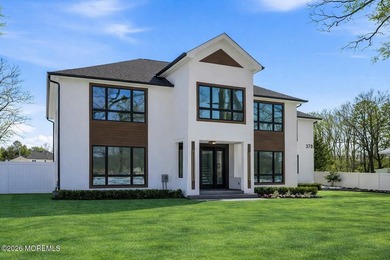 Welcome to this exceptional modern NEW CONSTRUCTION home set on - photo 1