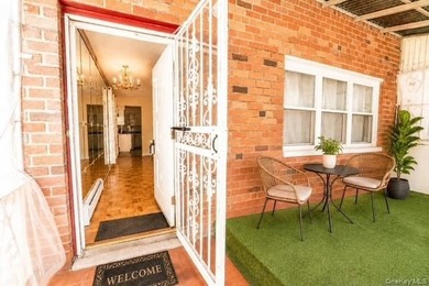 After 45 years, this charming semi-detached brick townhouse is - photo 3