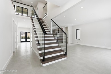 Welcome to this exceptional modern NEW CONSTRUCTION home set on - photo 5
