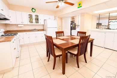 After 45 years, this charming semi-detached brick townhouse is - photo 7