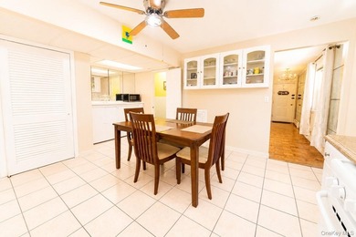After 45 years, this charming semi-detached brick townhouse is - photo 9