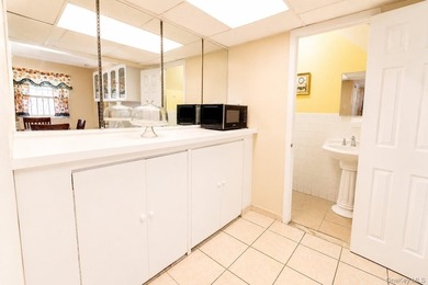 After 45 years, this charming semi-detached brick townhouse is - photo 10