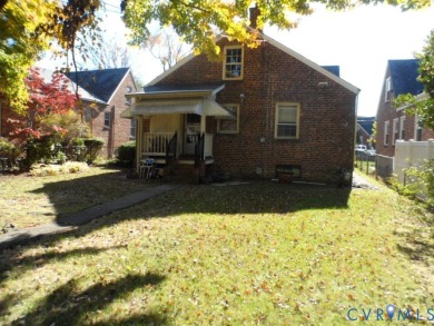 Welcome home to this brick cape cod with a slate roof in the