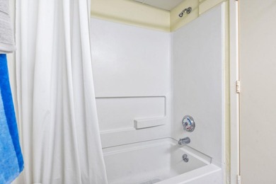 This well-cared for 10th floor sanctuary can either function as - photo 7
