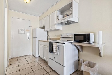This well-cared for 10th floor sanctuary can either function as - photo 10