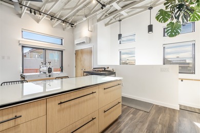 Corner unit with a wraparound balcony and mountain views in