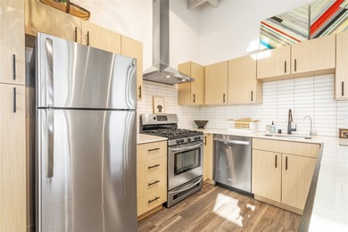 Corner unit with a wraparound balcony and mountain views in