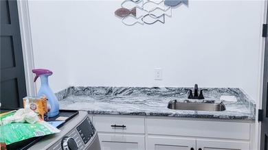 Welcome to your dream waterfront sanctuary on the highly coveted - photo 22