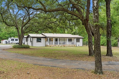 Step into a bright, split-layout ranch where the 2023 kitchen - photo 1
