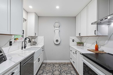 Step into a bright, split-layout ranch where the 2023 kitchen - photo 7