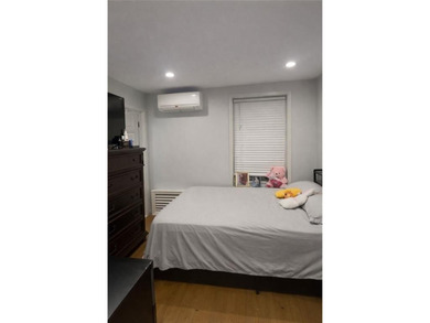A beautifully renovated two-family residence in the heart of - photo 11