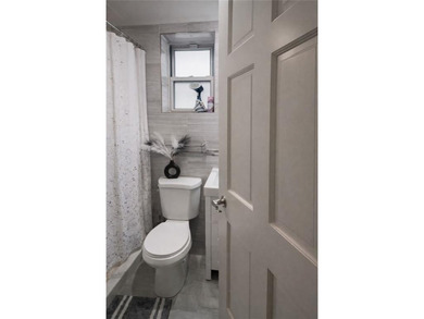 A beautifully renovated two-family residence in the heart of - photo 21
