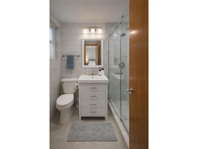 A beautifully renovated two-family residence in the heart of - photo 22