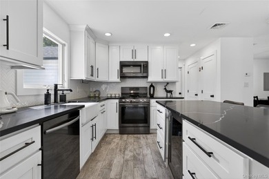 A Diamond, Completely Remodeled Colonial Located Mid-Block in - photo 6