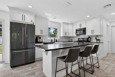 A Diamond, Completely Remodeled Colonial Located Mid-Block in - photo 7