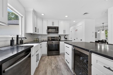A Diamond, Completely Remodeled Colonial Located Mid-Block in - photo 8