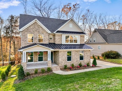 This custom-built luxury home offers over 5,500 square feet of - photo 2