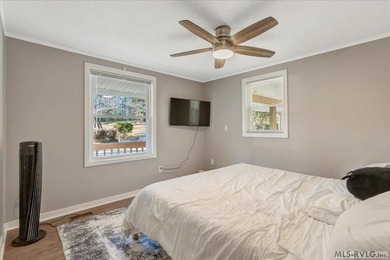 A renovated ranch on the shores of Poplar Creek. Privacy awaits