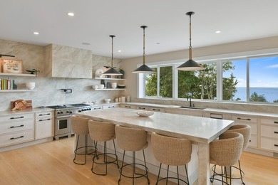 This stunning waterfront home is nestled within a coveted North - photo 10
