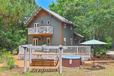 NO HOA AND OVER A HALF ACRE LOT! Bordered by lush vegetation and - photo 1