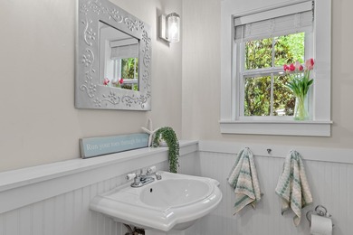 NO HOA AND OVER A HALF ACRE LOT! Bordered by lush vegetation and - photo 8