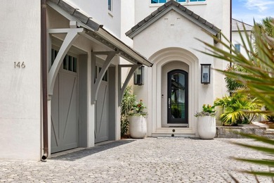 Set within the gated community of Paradise by the Sea, this - photo 4